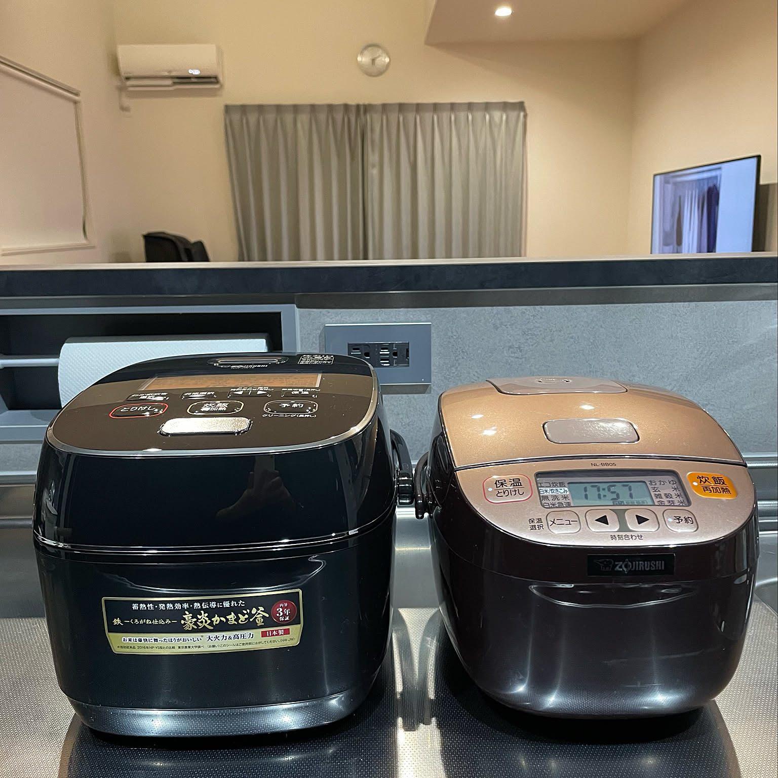 A black 5.5-cup Zojirushi rice cooker shown after a size upgrade from 3 cup.
