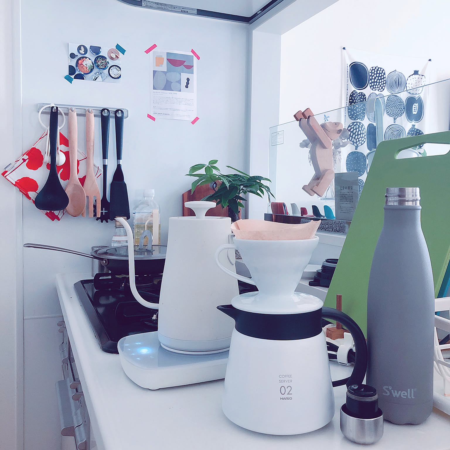 HARIO V60 server and dripper on a compact white kitchen counter.