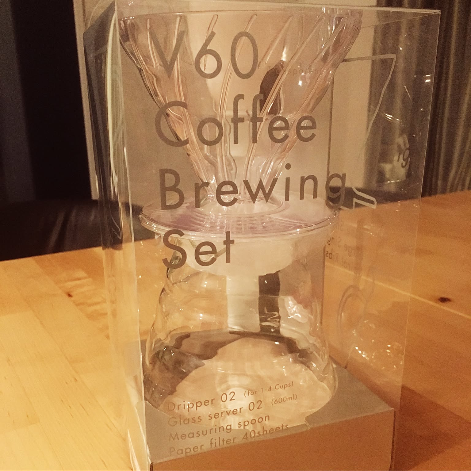 Boxed HARIO V60 Coffee Brewing Set with dripper, server, spoon, and filters.