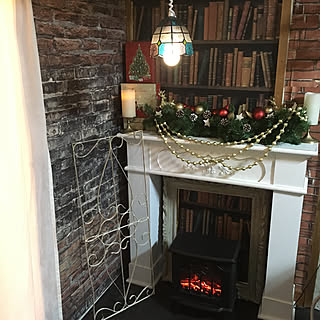 レンガ壁紙 暖炉型ファンヒーターのインテリア実例 Roomclip ルームクリップ