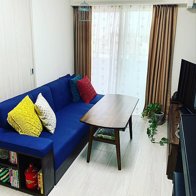 ソファベッド,オレンジカーテン,Lounge chisaaaaの部屋